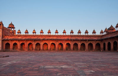 View of temple against clear blue sky