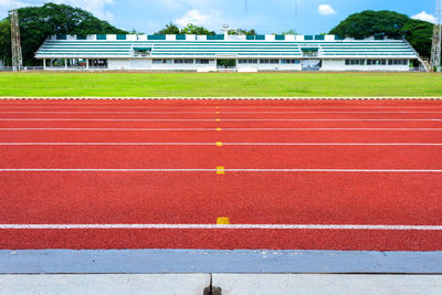 View of empty road by built structure