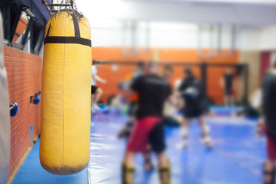 Close-up of yellow punching bag