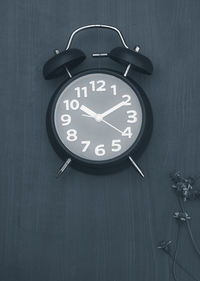 Close-up of clock on wall