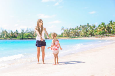 Woman standing on beach