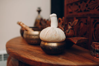 Close-up of spa equipment on table