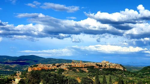 Aerial view of townscape against sky