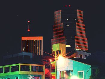 Low angle view of illuminated building at night