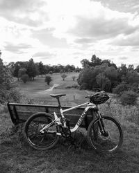 Bicycle parked on landscape