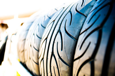 Close-up of tires arranged outdoors