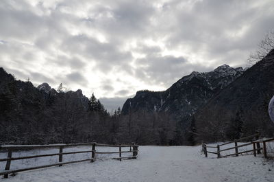 Scenic view of mountains against sky during winter