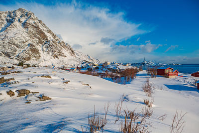 Scenic view of snow covered mountain against sky