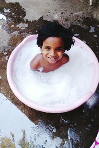 Portrait of girl in wash bowl