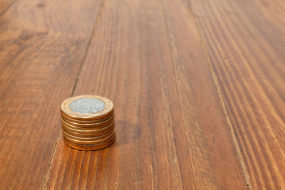 High angle view of coins on table