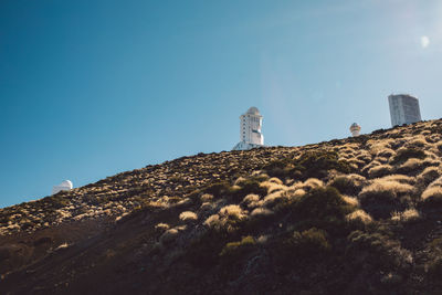 Low angle view of lighthouse against sky