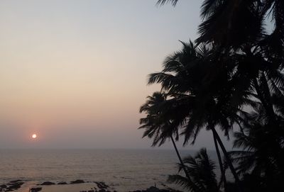 Scenic view of sea against sky at sunset