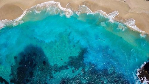 High angle view of rocks on beach