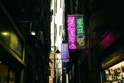 Low angle view of illuminated city at night