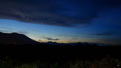 Scenic view of silhouette landscape against sky during sunset
