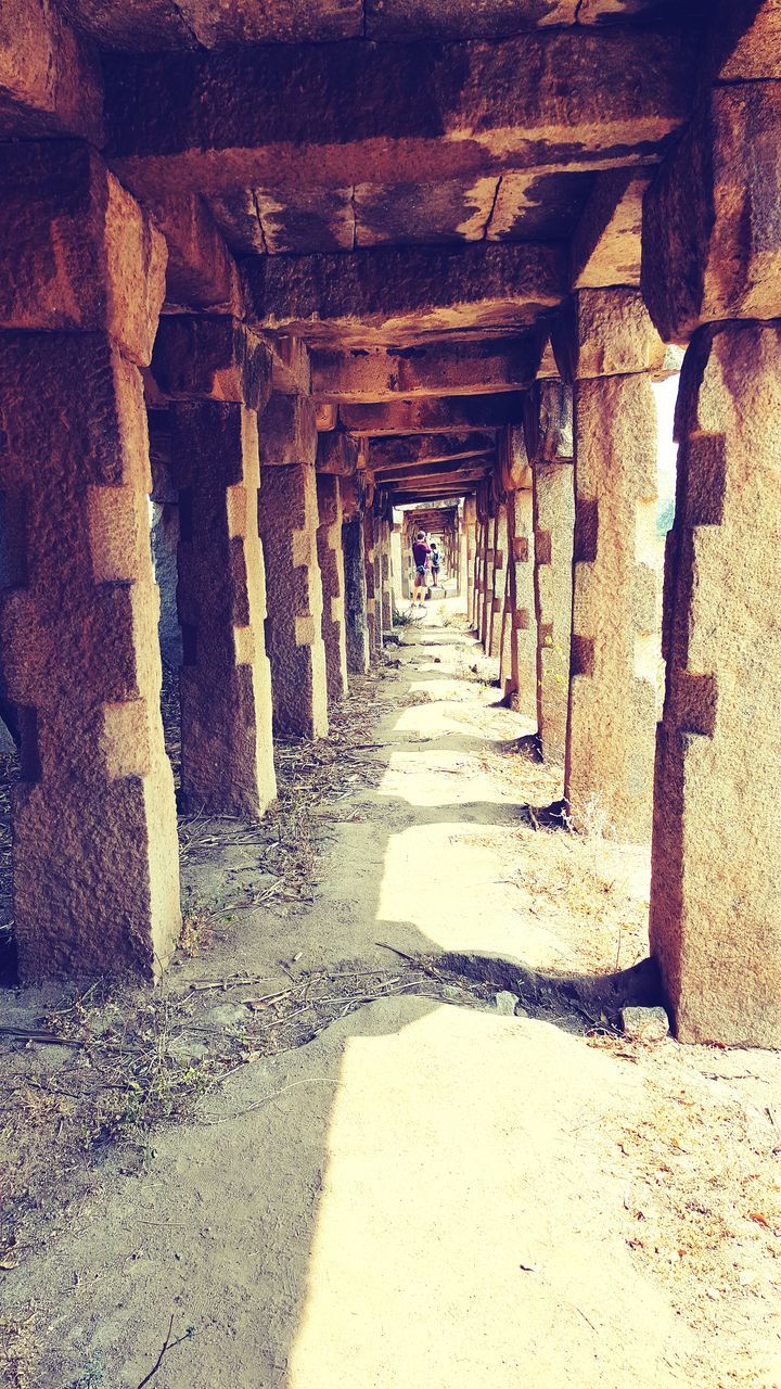 the way forward, architecture, built structure, diminishing perspective, vanishing point, indoors, narrow, wall - building feature, corridor, wall, in a row, building, empty, walkway, long, no people, old, tunnel, cobblestone, stone wall