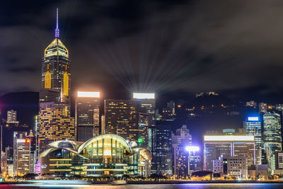 Illuminated modern buildings in city at night