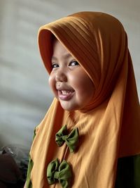 Portrait of young woman wearing hijab