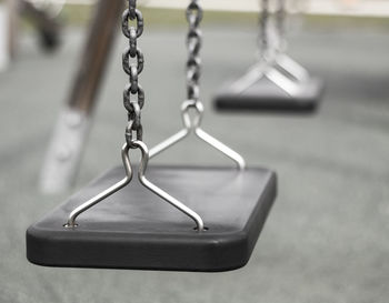 Close-up of swing at park