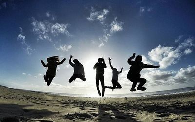 Low angle view of woman jumping