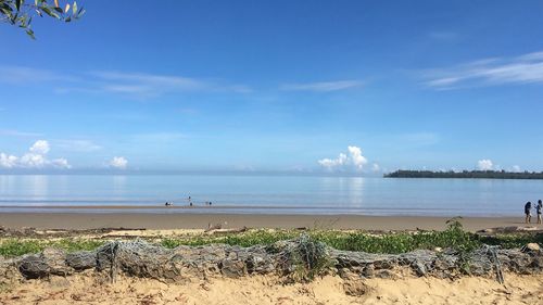 Scenic view of sea against blue sky