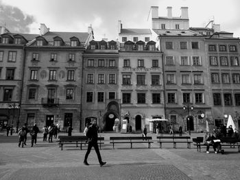 People in front of building