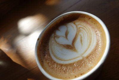 High angle view of cappuccino on table