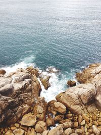 High angle view of rocks on beach