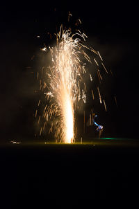 Firework display at night