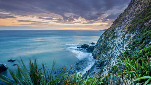 Scenic view of sea against sky during sunset
