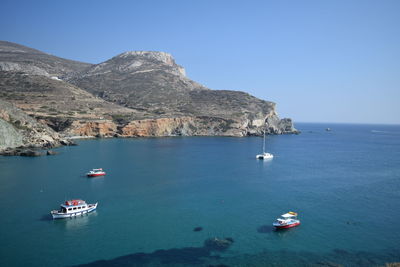 Boats sailing in sea