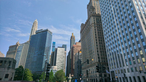 Low angle view of buildings against sky in city