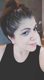 Close-up portrait of young woman