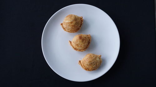 High angle view of cookies in plate