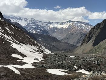 Scenic view of snowcapped mountains against sky