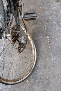 High angle view of abandoned bicycle on road