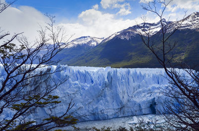 Scenic view of moreno glacier against mountains in winter