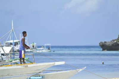 People on boat in sea