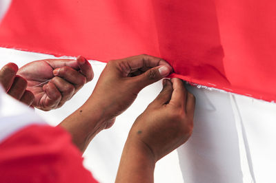 Close-up of couple holding hands