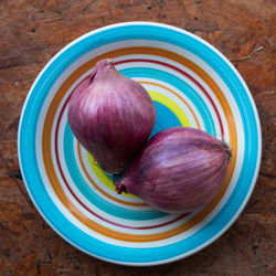 High angle view of purple in bowl on table
