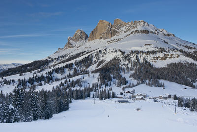 Snow covered mountain against sky