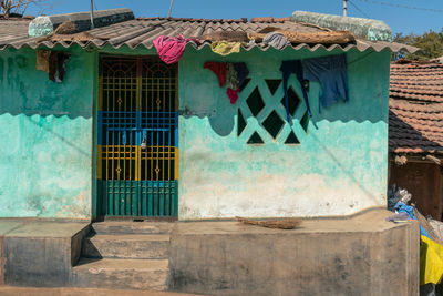 Exterior of house against blue wall