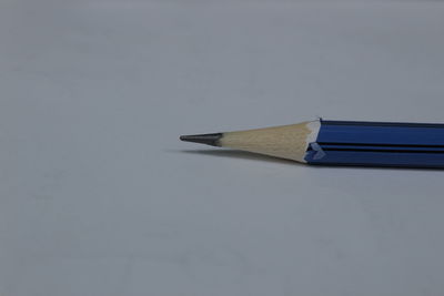 High angle view of pencils against white background