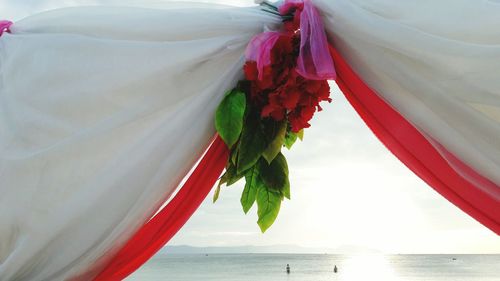 Close-up of umbrella on beach