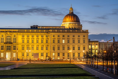 The imposing reconstructed city palace in the heart of berlin at dawn