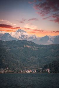 Scenic view of mountains against sky during sunset