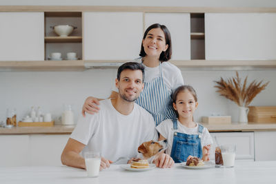 Family on table at home