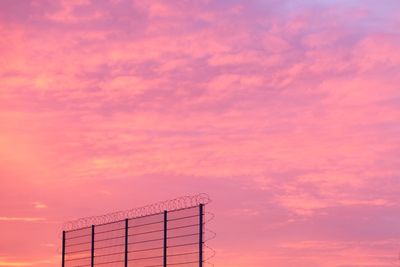 Low angle view of cloudy sky at sunset