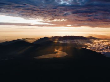 Scenic view of mountains against sky during sunrise