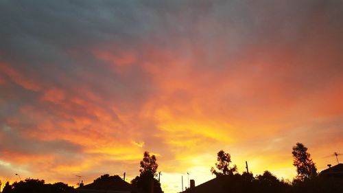 Low angle view of cloudy sky at sunset